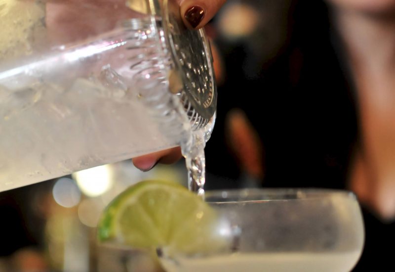 bartender pouring cocktail