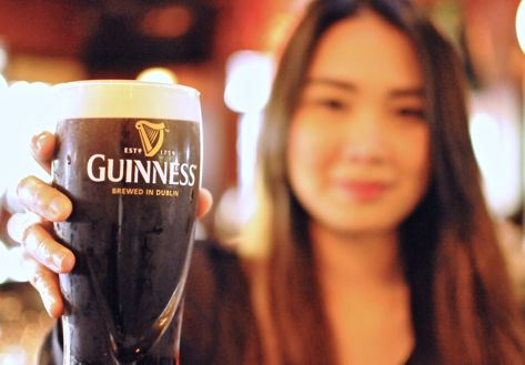 bartender with guinness pint